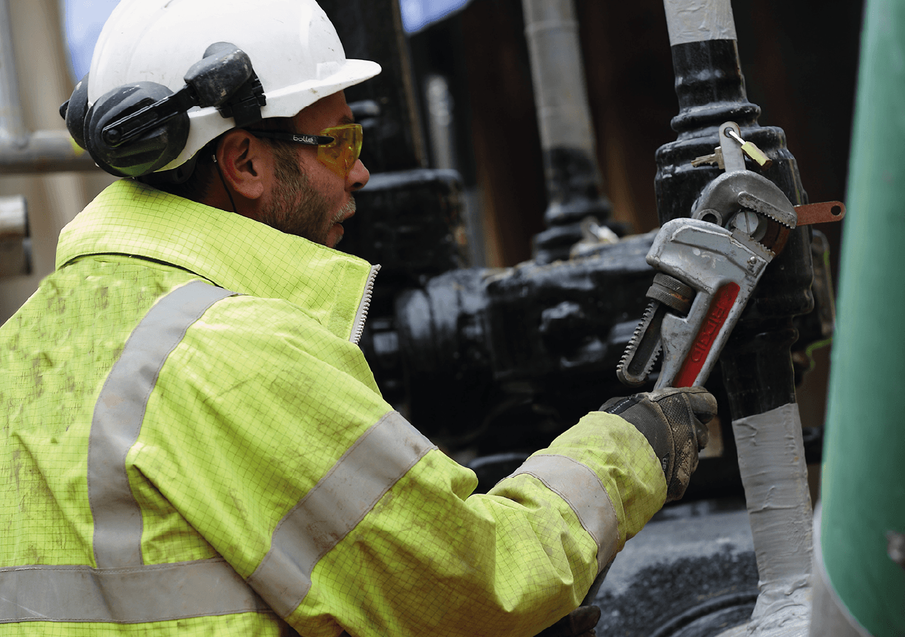 employee installing gas infrastructure