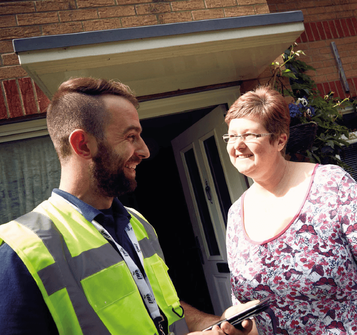 property services employee standing with resident