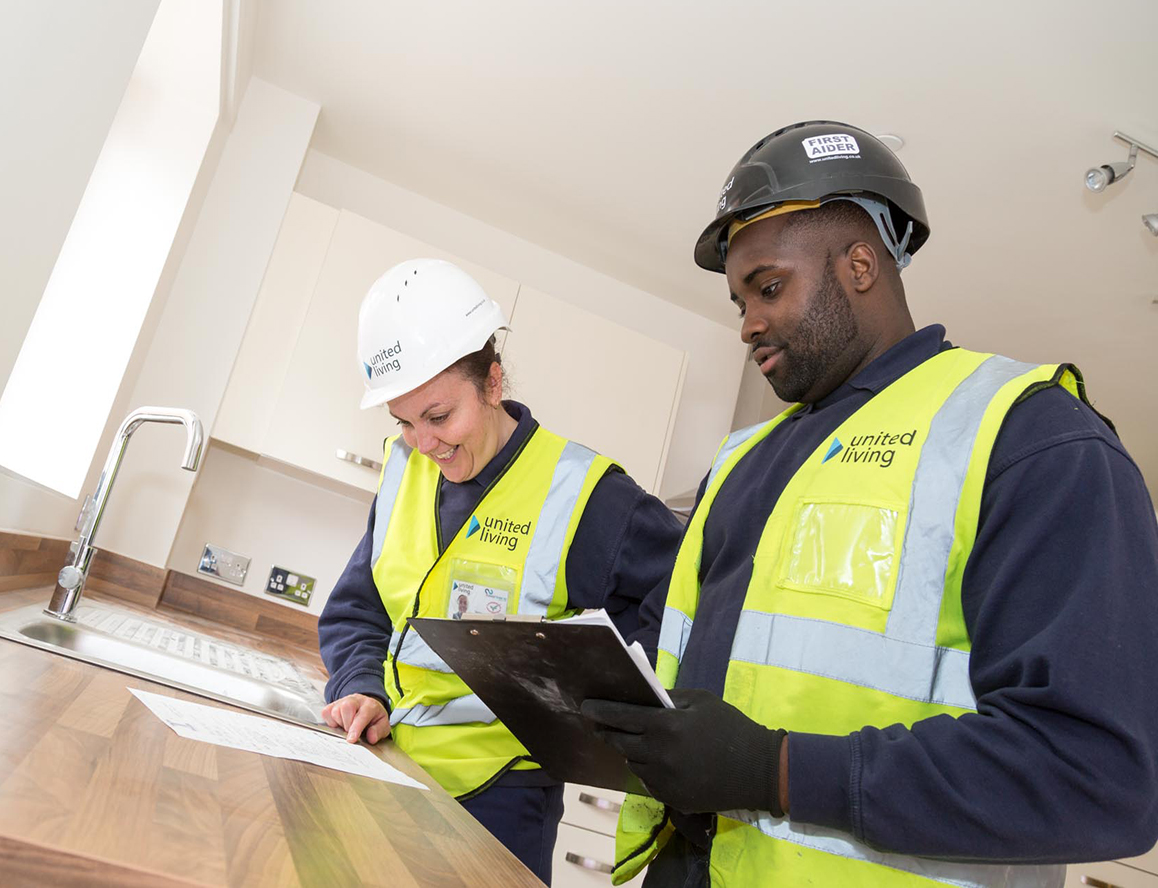 employees working in newly refurbished kitchen